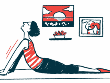 A person does stretching exercises at home on a mat on the floor.